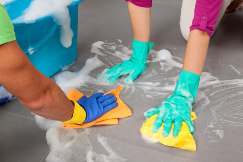 Team maintaining a safe and tidy cleaning workspace